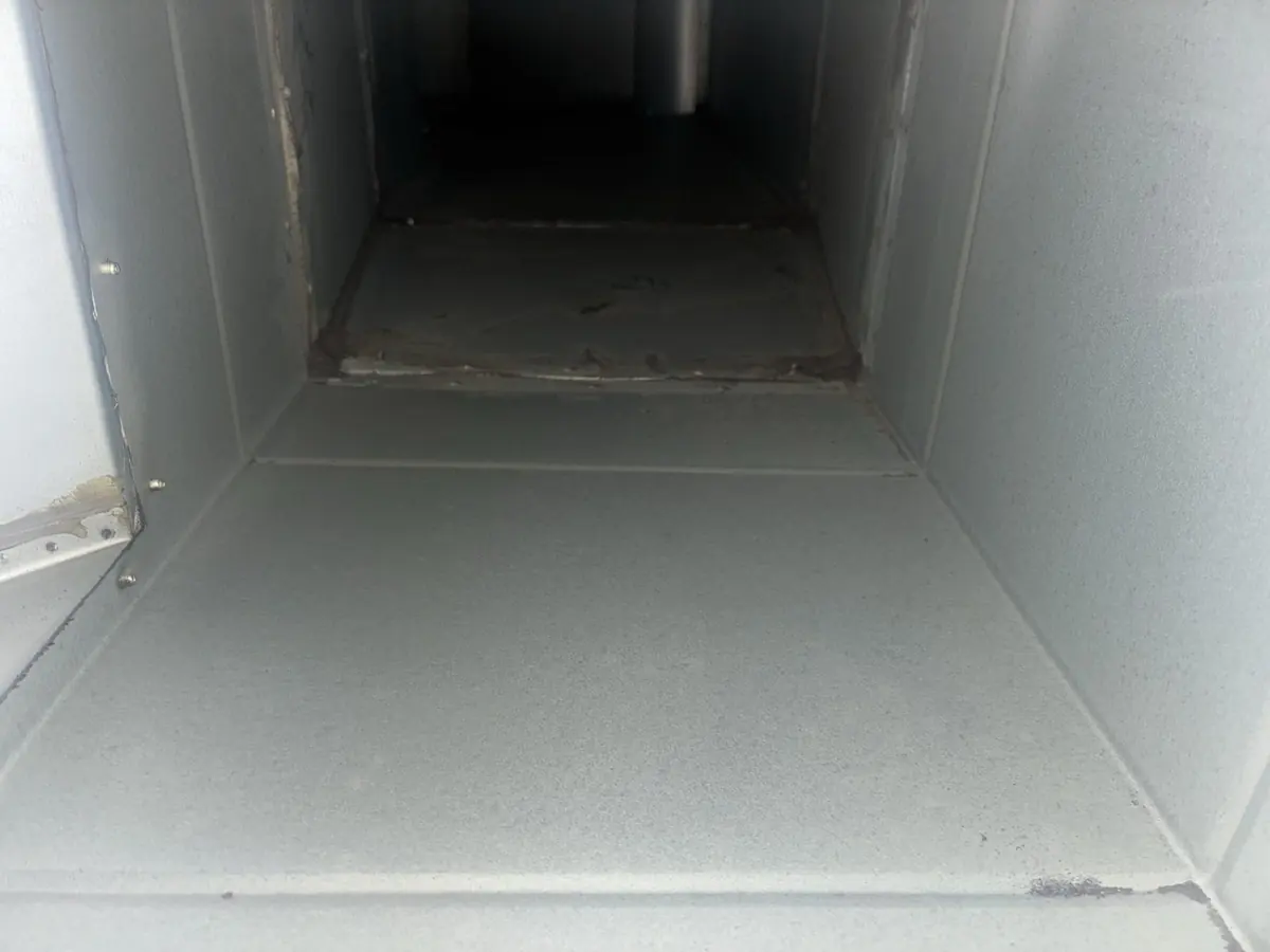 Square commercial kitchen extract ductwork one metre from the canopy, cleaned