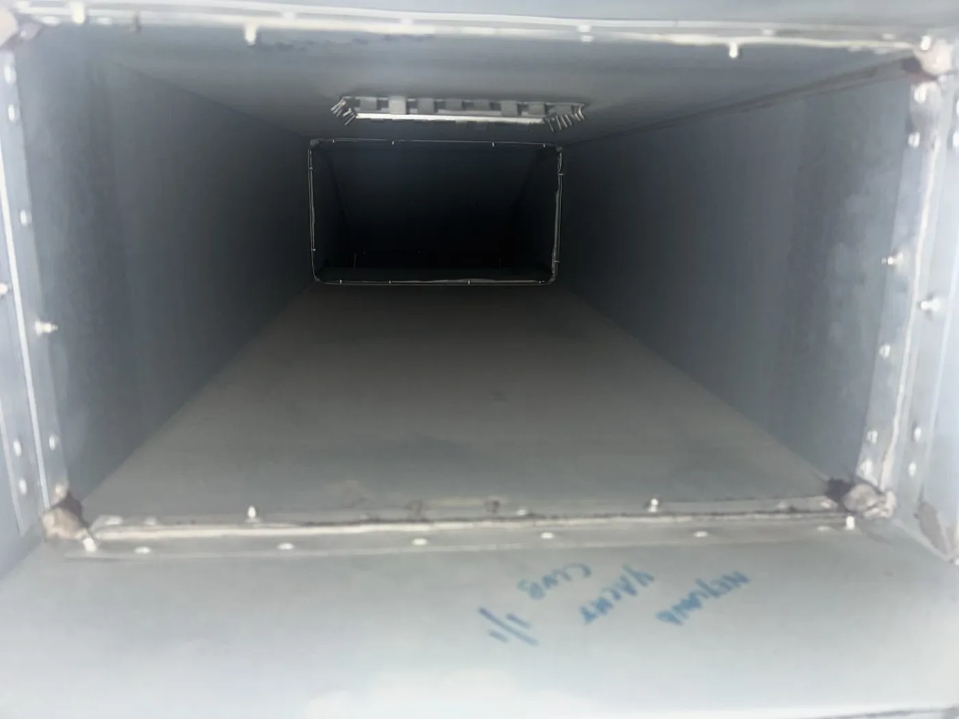 Interior of commercial kitchen extract ductwork after cleaning, three metres from the canopy