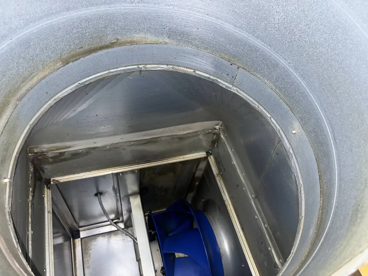 Kitchen extract fan housing and ductwork transition after cleaning